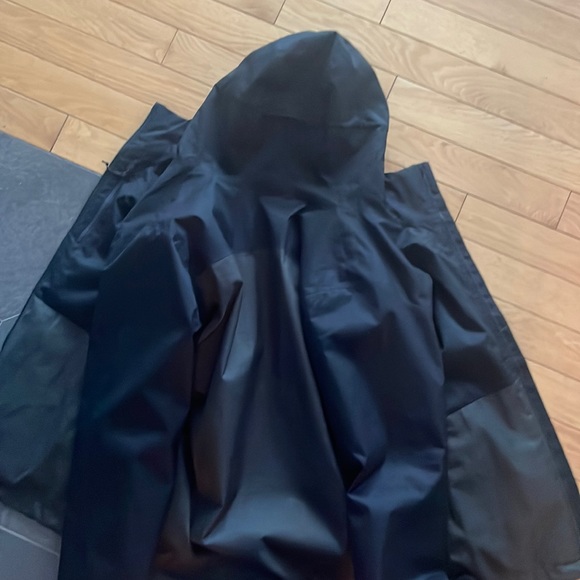 Under armor storm Jacket,, size large green exterior with a beige interior. - Picture 1 of 4